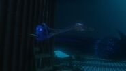 The squid chasing after Dory, Marlin, and Nemo.