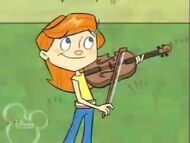 Riley playing the violin