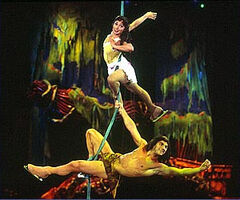 Tarzan and Jane swing through the jungle