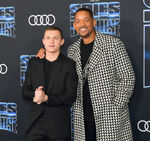 Will Smith and Tom Holland at the premiere of Spies in Disguise in December 2019.