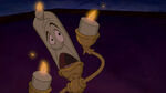 A frightened Lumiere as the Beast arrives