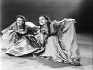 Helene Stanley posing as Anastasia with Rhoda Williams as Drizella.