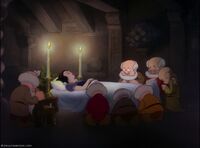 The Seven Drawfs crying for Snow White lay dead on the bed