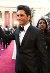 John Stamos arrives at the 85th annual Academy Awards in February 2013.