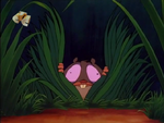 The tarsier hiding back in the grass