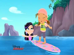 Marina giving Izzy surfing lessons.