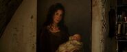 A portrait of Belle's mother and a baby Belle in the 2017 remake.