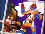 ComicBookCapers.jpg (45 KB) In the comic, Darkwing and Launchpad run from the giant Megavolt.