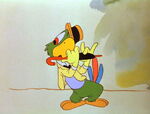 José uses his umbrella as an instrument.