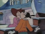 Peg kisses Goofy