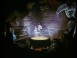 The Witch brewing a potion for the poisoned apple in a deleted scene.