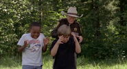 Noah, Henry and Sheriff Bob getting sprayed by the skunk