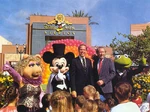 Jim Henson (left of Kermit) with Michael Eisner (middle) and (from right to left) Mickey Mouse and Miss Piggy.