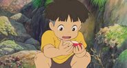Sosuke surprised when Ponyo licks his cut.
