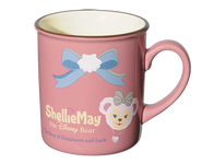 A ShellieMay ceramic cup.