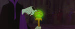 Maleficent using her staff.