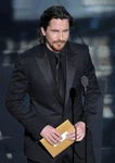 Christian Bale speaks onstage at the 84th annual Academy Awards in February 2012.