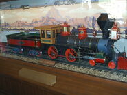 Replica of the Lilly Belle, put on display in Main Street Station after the original was removed. This engine was intended to be a 4-6-0 for the Carolwood Pacific, but the project was abandoned when work started on Disneyland.