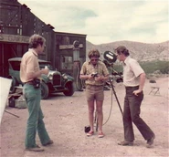 Cinematographers Lynn Ellsworth, Peter B. Good, and director Fred R. Krug on a The Golden Dog set at Corona de Tucson, Arizona in 1974