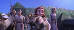 Young Iduna carrying a baby reindeer