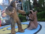 Chewbacca & Jawa.jpg (84 KB) Chewbacca and a Jawa compete in the contest with Bee Gees'-styled disco moves during Star Wars Weekends.