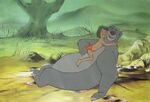 Rare production cel of Baloo hugs Mowgli.