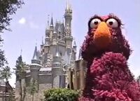 Telly Monster in front of Cinderella Castle in the Magic Kingdom.