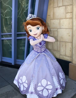 Sofia posing for a photo at Disney California Adventure.