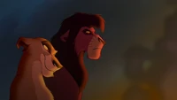 Zira and Kovu survey the fire