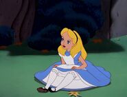 Alice sitting down