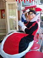 The Queen of Hearts at the Refreshment Corner