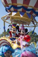 Minnie with Mickey Mouse advertising the Disney Festival of Fantasy Parade