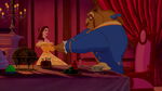 Belle urging Beast to dance