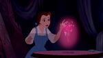 Belle about to stroke the rose's petals