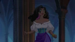 A shocked Esmeralda witnessing Quasimodo being scolded and scared away by a selfish parishioner.