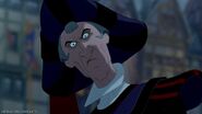 Frollo is angry at Quasimodo for leaving the bell tower