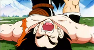 Goku screams in pain as his ribs are being crush