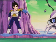 Vegeta watches from behind a mountain and remains hidden from Frieza and Zarbon looking for him and Dragon Balls