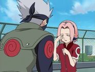 Sakura cries as Kakashi tells her that everything will be alright.