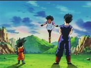 Videl landing on the ground to meet Gohan and Goten