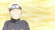 Naruto smiling after he tells Kushina his dream is to become Hokage.