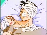 Future Gohan wakes up from his injuries and asks Bulma where the androids are.