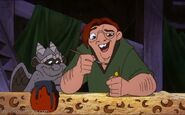 Quasimodo making a wooden carve doll of Madellaine