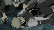 Minato lays dead on the ground after he seals Kurama inside Naruto.