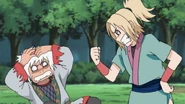 Tsunade hits Jiraiya.
