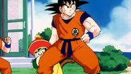 Gohan hides behind his father