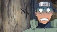 Iruka sees Naruto is not great at doing the Shuriken Technique.