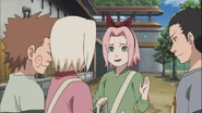 Choji and the others greet Sakura.