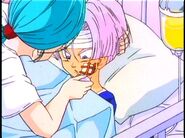 Future Bulma treats her son's injuries.