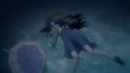Masaki lies dead on top of an unconscious Ichigo.